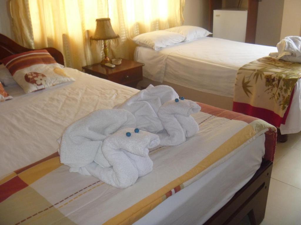 Hotel Casa Los Delfines Puerto Villamil Zimmer foto